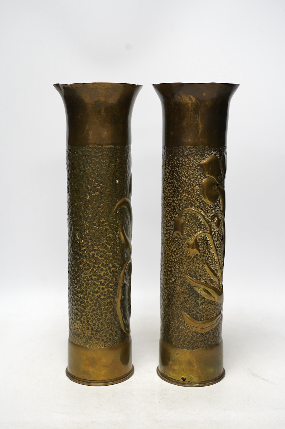 A pair of Trench Art shell case vases, 35cm. Condition - fair